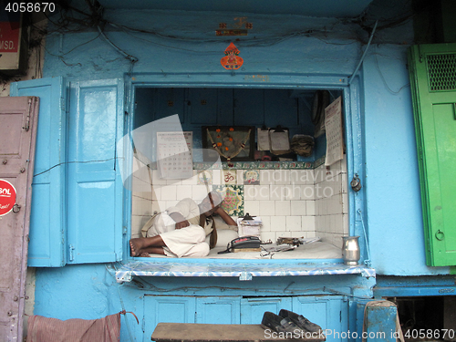 Image of Streets of Kolkata. notary sitting in his office