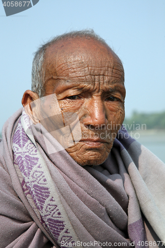 Image of Portrait of a day laborer in Kumrokhali, West Bengal, India