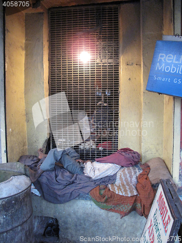 Image of Streets of Kolkata, man sleeping on the street