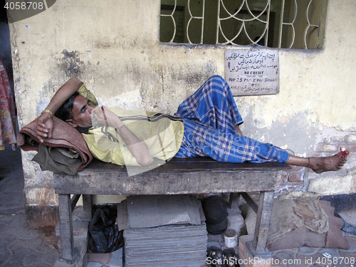 Image of Streets of Kolkata, man sleeping on the street