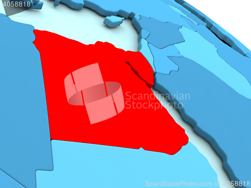 Image of Egypt in red on blue globe