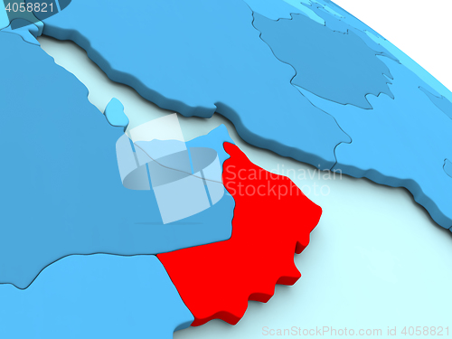 Image of Oman in red on blue globe