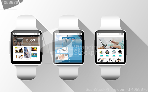 Image of close up of black smart watches with applications