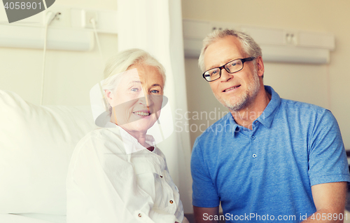 Image of senior couple meeting at hospital ward