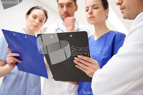 Image of close up of doctors with clipboard at hospital