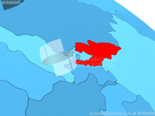Image of Kyrgyzstan in red on blue globe