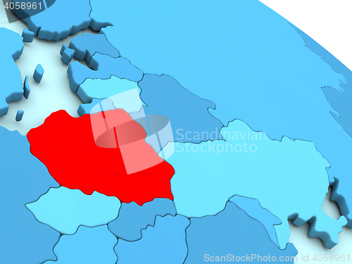 Image of Poland in red on blue globe