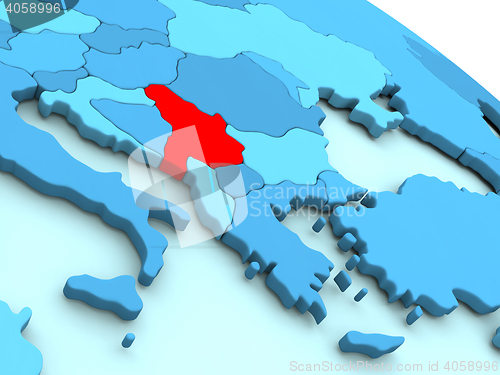 Image of Serbia in red on blue globe