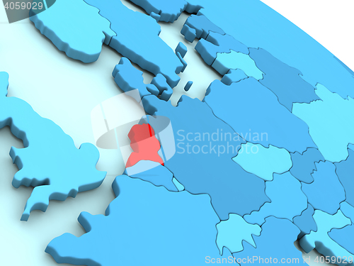 Image of Netherlands in red on blue globe