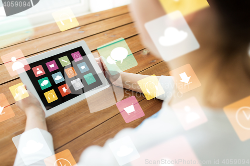 Image of close up of woman with menu icons on tablet pc