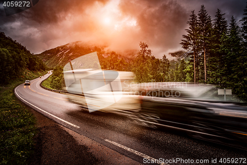 Image of Caravan car travels on the highway.