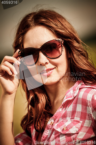 Image of Girl with sunglasses