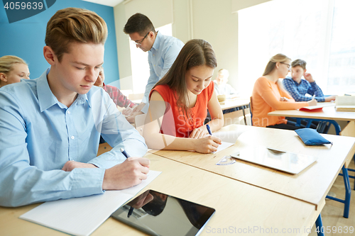 Image of group of students and teacher at school classroom