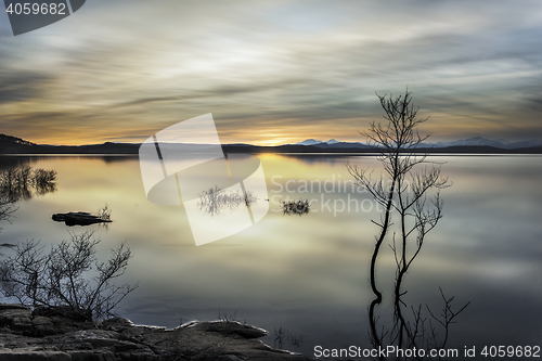 Image of shiny lake photographed during the golden hour