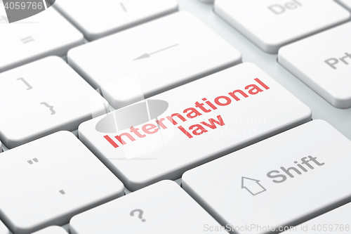 Image of Political concept: International Law on computer keyboard background