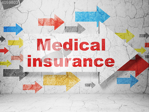 Image of Insurance concept: arrow with Medical Insurance on grunge wall background