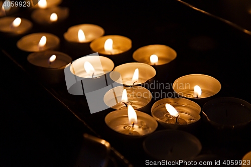 Image of Candles in a dark church