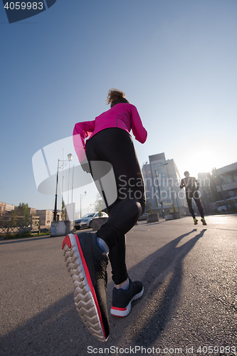 Image of young  couple jogging