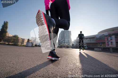 Image of young  couple jogging