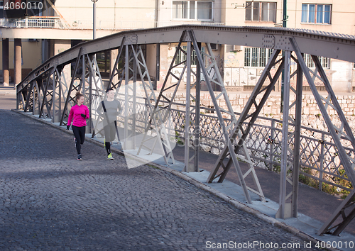 Image of young  couple jogging