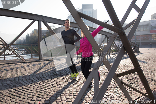 Image of young  couple jogging