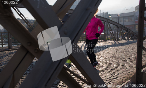 Image of young  couple jogging