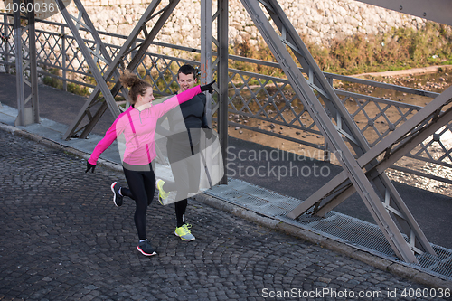 Image of young  couple jogging