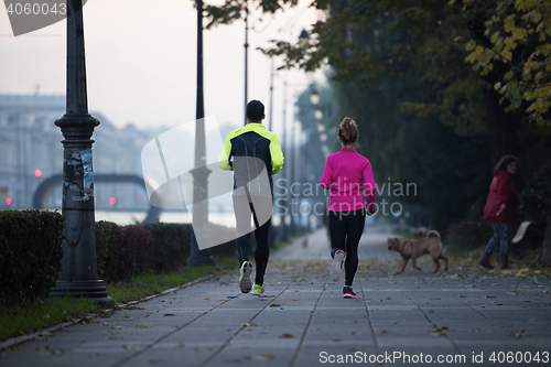 Image of young  couple jogging