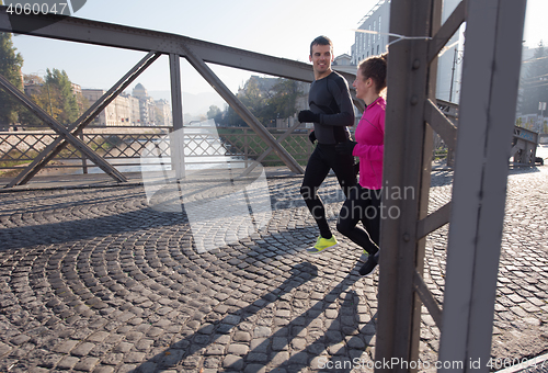 Image of young  couple jogging