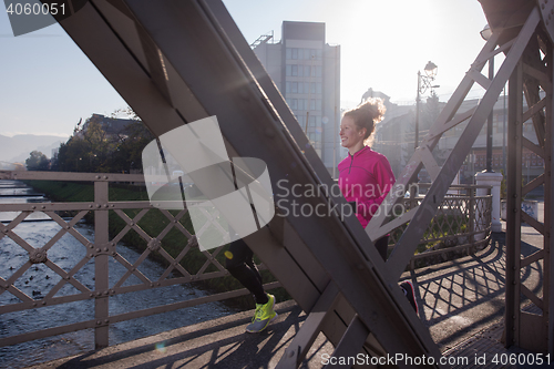 Image of young  couple jogging