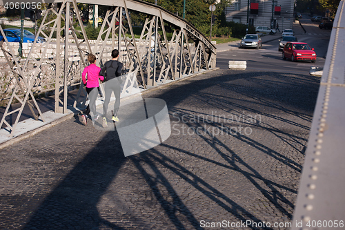 Image of young  couple jogging