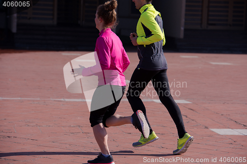 Image of young  couple jogging