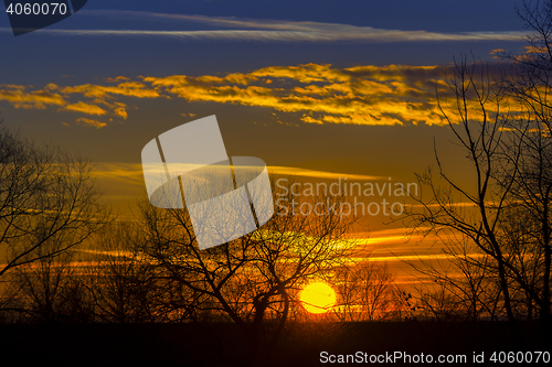 Image of Landscape Dramatic sunset and sunrise sky with a silhouette of t