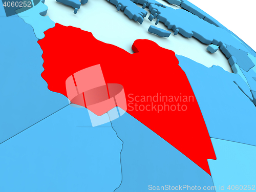 Image of Libya in red on blue globe