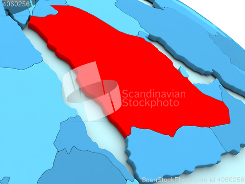 Image of Saudi Arabia in red on blue globe