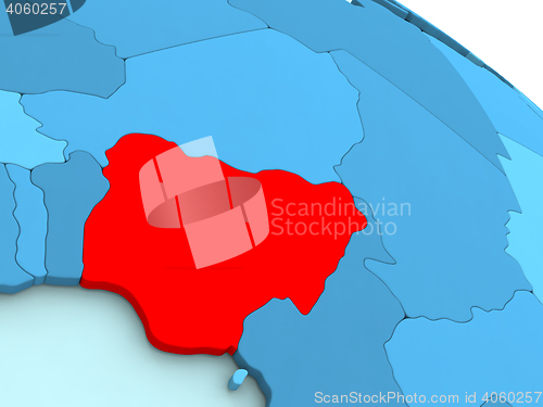 Image of Nigeria in red on blue globe