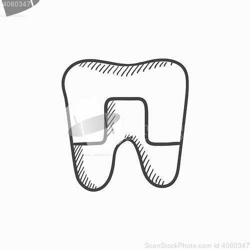 Image of Crowned tooth sketch icon.