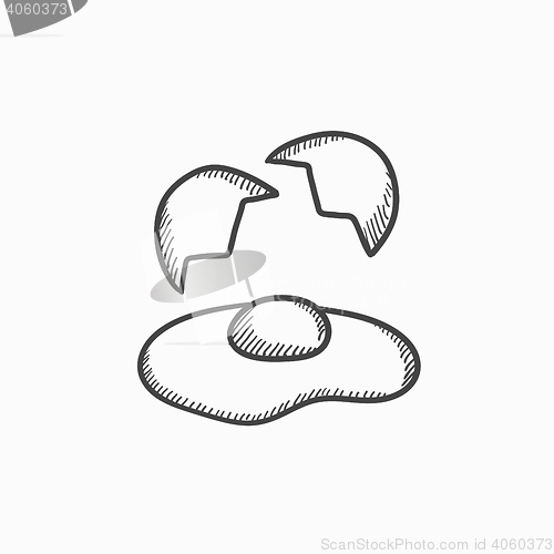 Image of Broken egg and shells sketch icon.