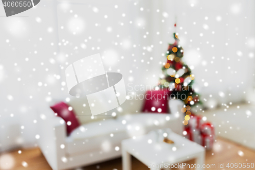 Image of blurred living room with christmas tree background