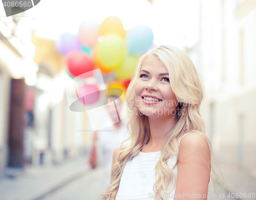 Image of couple with colorful balloons