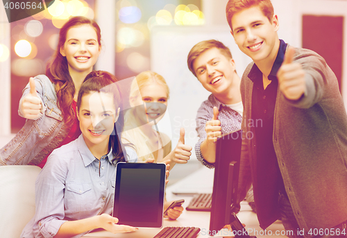 Image of students with monitor and blank tablet pc screen