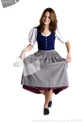 Image of woman in Dirndl drops a curtsey