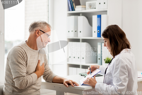 Image of senior man and doctor meeting at hospital