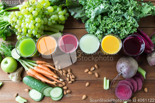 Image of glasses with different fruit or vegetable juices