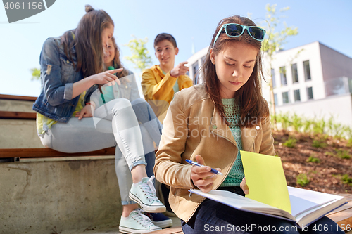 Image of student girl suffering of classmates mockery