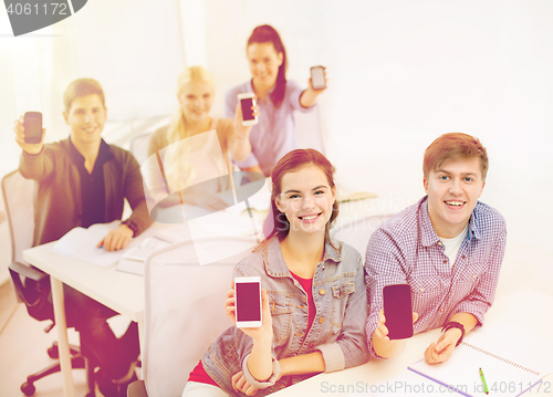 Image of students showing black blank smartphone screens