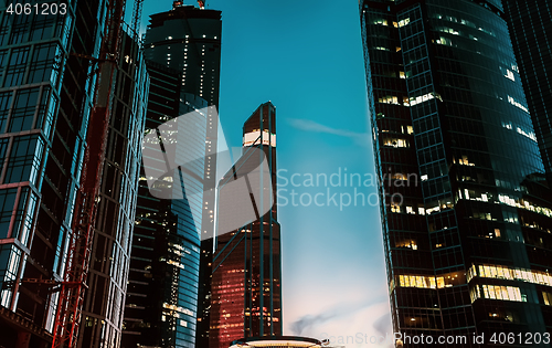 Image of Skyscrapers With Glass Walls Against The Night Sky