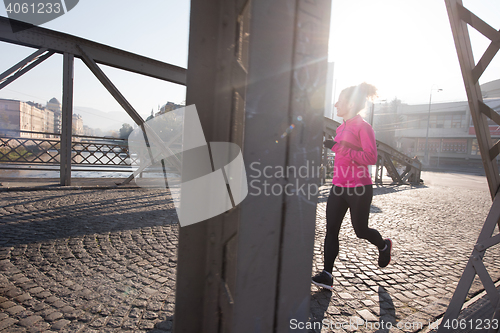 Image of young  couple jogging