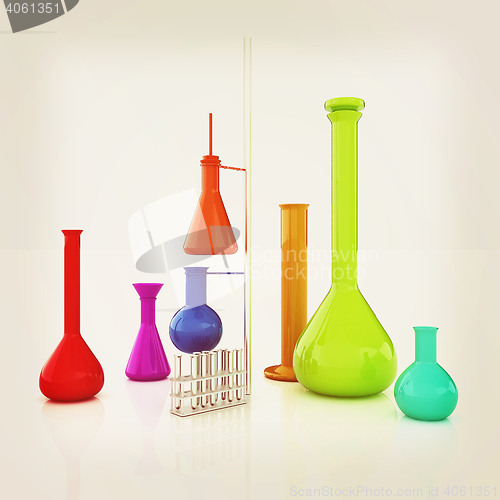 Image of Chemistry set, with test tubes, and beakers filled with colored 