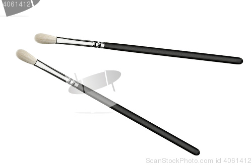Image of two make up brushes